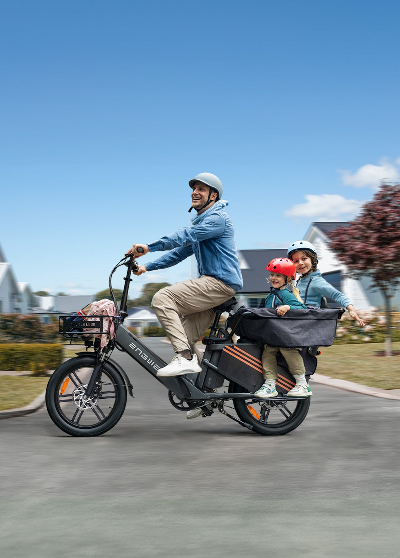 a man riding an Engwe Le20 family ebike with two children